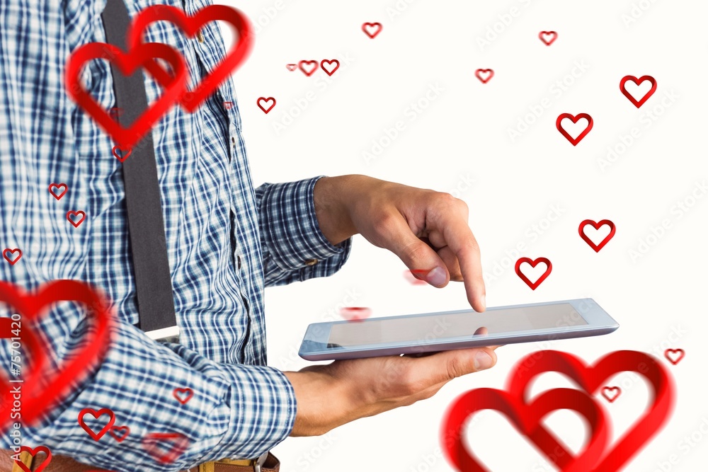 Poster composite image of geeky businessman using his tablet pc