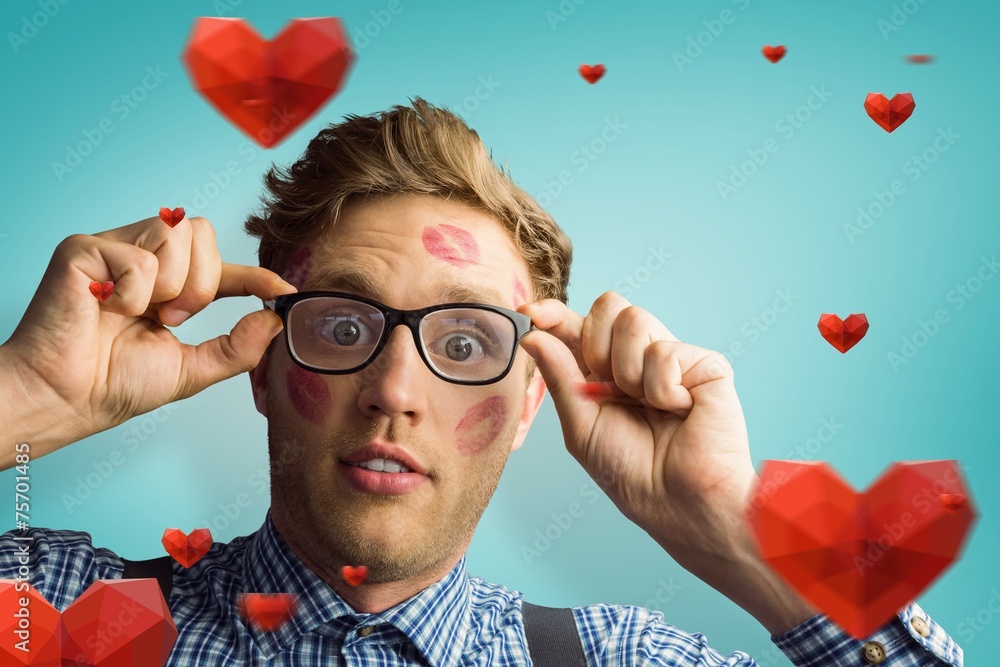 Aufkleber composite image of geeky hipster covered in kisses