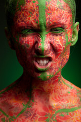 Obraz premium close up of a face of a girl with creative visage. Face art.