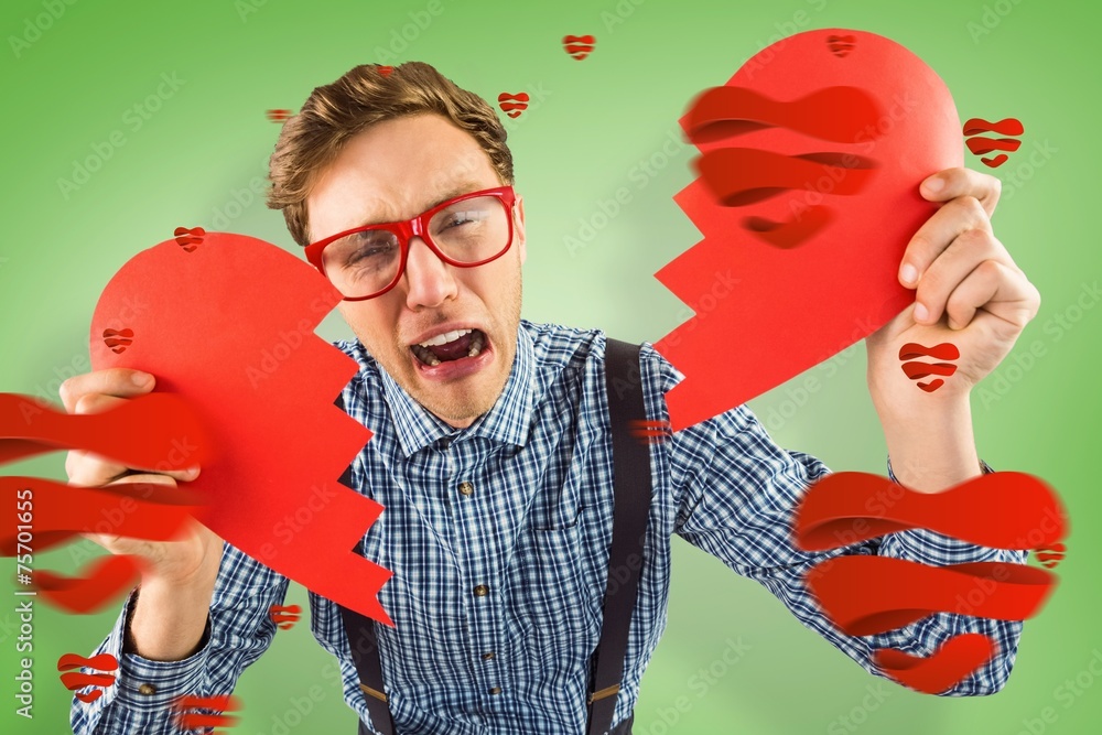 Poster composite image of geeky hipster holding a broken heart