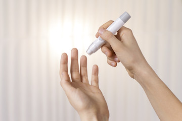 measuring the level of glucose in the blood with glucometer