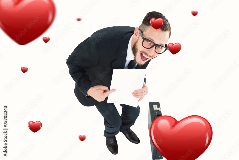 Aufkleber composite image of geeky smiling businessman showing paper