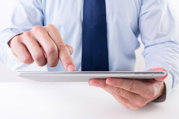 Businessman using a digital tablet.