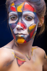 circus color face art woman close up portrait