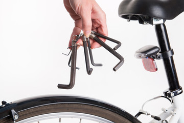 Adjustment and repair of the bike with the allen key