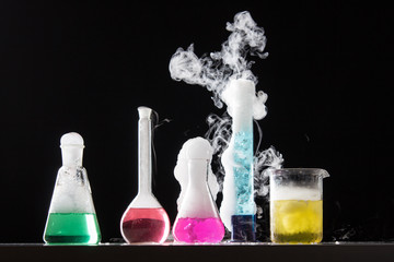 Glass in a chemical laboratory filled with colored liquid during
