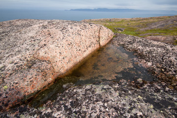 fresh water in rock among salty ocean