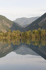 reflection of mountains in lake
