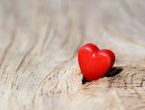 Valentines Day background. Hearts on Wooden Texture. Macro
