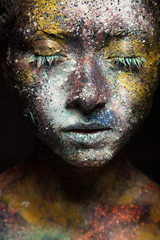 Fototapeta premium Glitter makeup on a beautiful woman face.