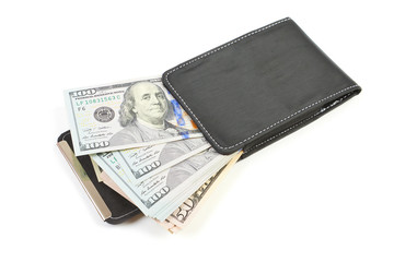 Black leather wallet with dollars. Isolated on white