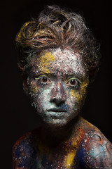 Glitter makeup on a beautiful woman face.