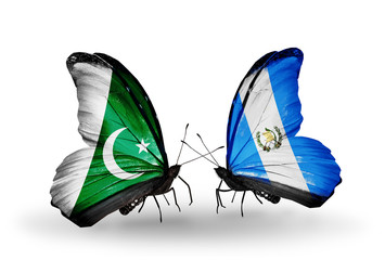 Two butterflies with flags Pakistan and Guatemala
