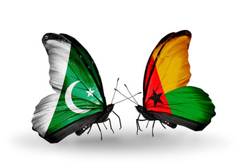 Two butterflies with flags Pakistan and Guinea Bissau