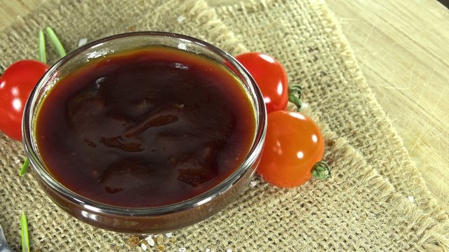 Rotating BBQ Sauce (not seamless loopable) as 4K UHD footage