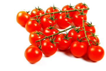 bunnch of cherry tomatoes isolated on a white background