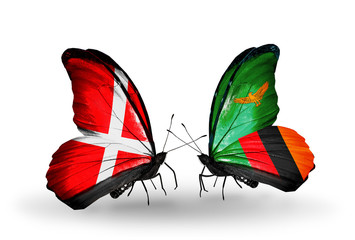 Two butterflies with flags Denmark and Zambia