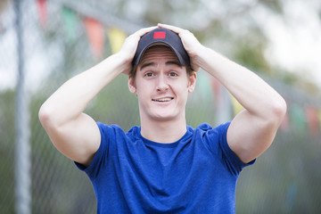 portrait of a young man with a hat