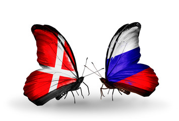 Two butterflies with flags Denmark and Russia