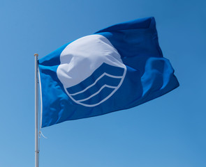 Blue flag on beach