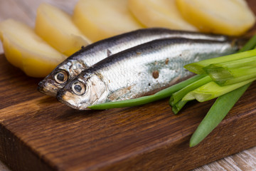 spicy salted anchovies, onions and boiled potatoes