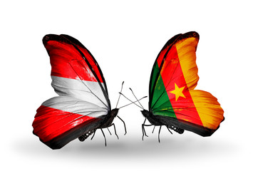 Two butterflies with flags Austria and Cameroon