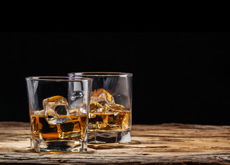 Whiskey drinks on wood