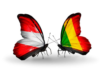 Two butterflies with flags Austria and Mali