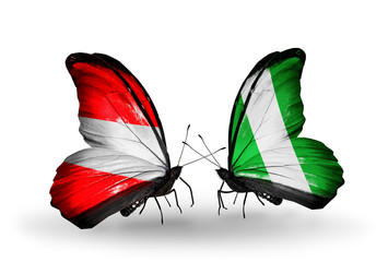 Two butterflies with flags Austria and Nigeria