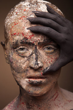 color face art women portrait with monster devil black hands.