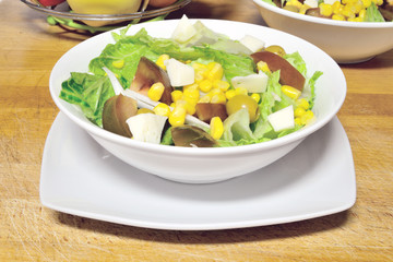 Green Salad served in a white bowl