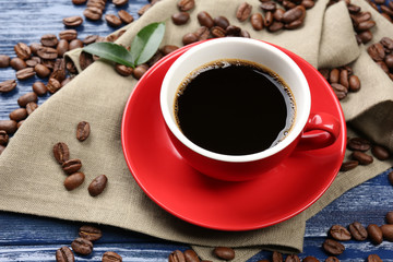 Cup of coffee on wooden table
