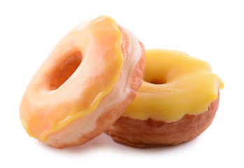 Delicious donuts with glaze isolated on white