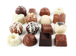 Delicious chocolate candies isolated on white