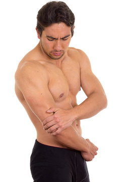 muscular shirtless man with elbow pain