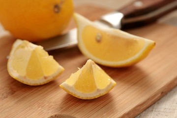 Fresh lemon on a cutting board.