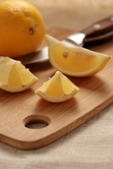 Fresh lemon on a cutting board.