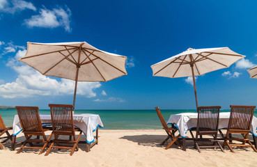 table set and umbrella on the beach