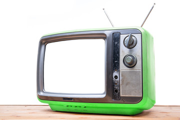 Green Vintage TV on wood table