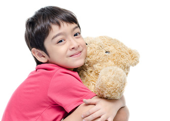 Little boy hold teddy bear on white backgground