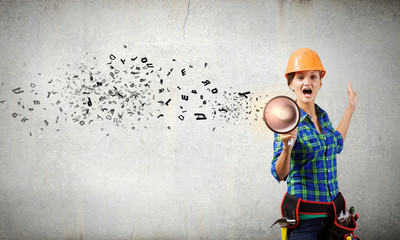 Construction worker announcing something