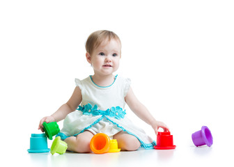 little girl playing with toys
