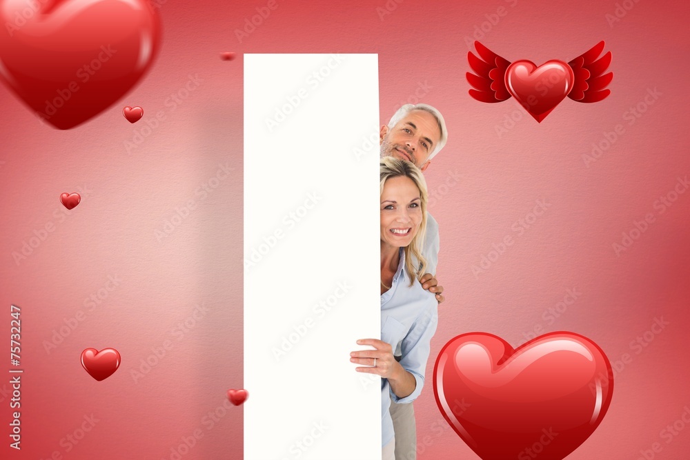 Poster composite image of happy couple showing large poster