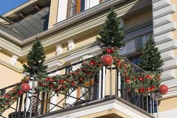 Fototapeta na wymiar Christmas decorations on the balcony (Kislovodsk, Russia)