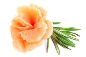 Sliced and rolled salmon isolated on white