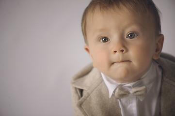 Handsome little boy in suit