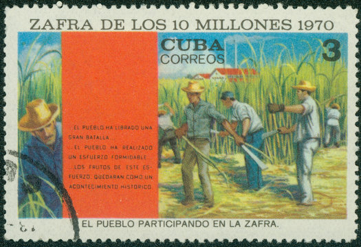 stamp shows the people participating in the harvest