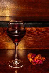 abstract image of a glass of wine and bikini and a shoe