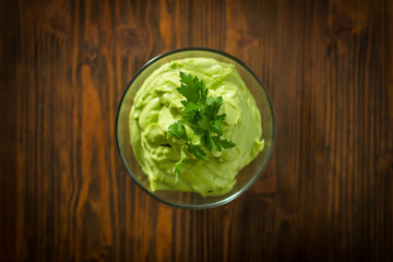 Guacamole on wooden table