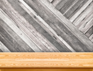 wood table at blurred colorful plank wooden wall in background